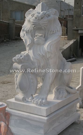 Carved marble lion sculpture