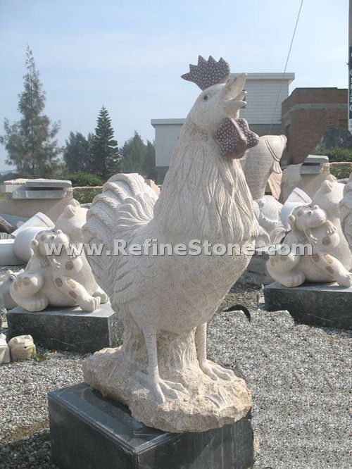 Cock statue
