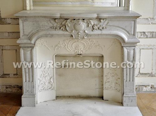 Highly carved carrara marble fireplace